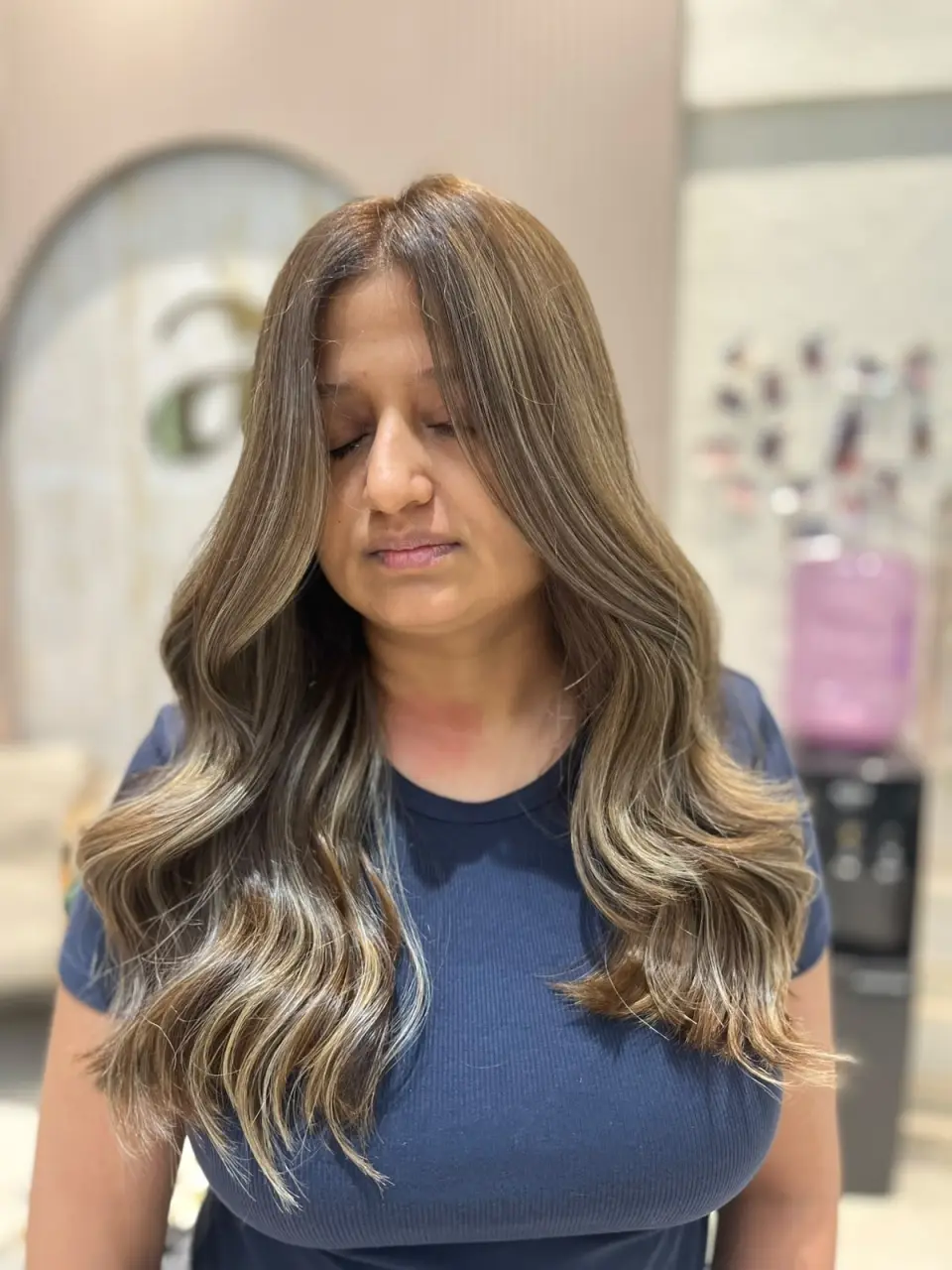 Soft ash highlights on long hair, finished at Ally 21